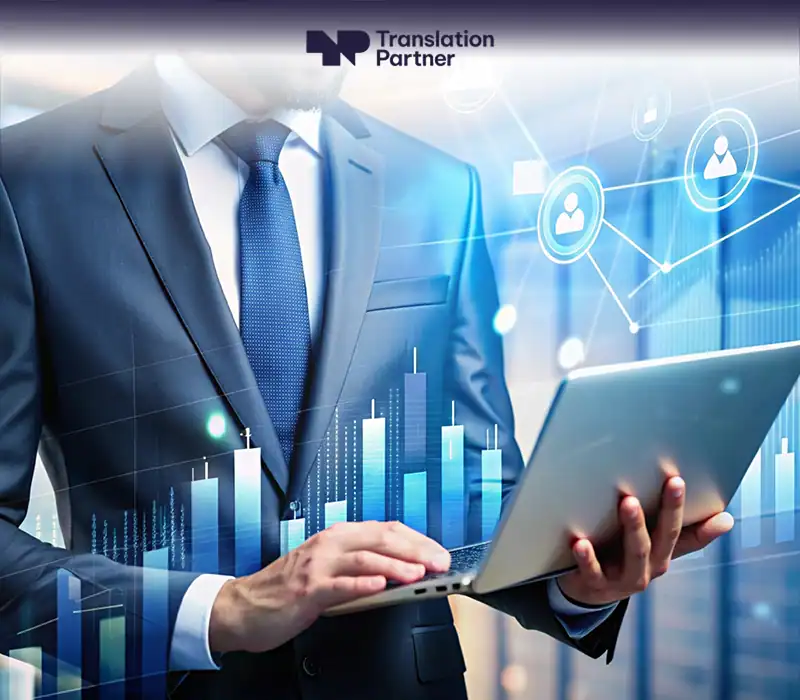 Businessman with laptop overlaid with digital charts and network icons, symbolizing finance